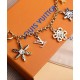 Replicas Louis Vuitton LV Snowflakes Chain Bag Charm Dorado Baratos Imitacion